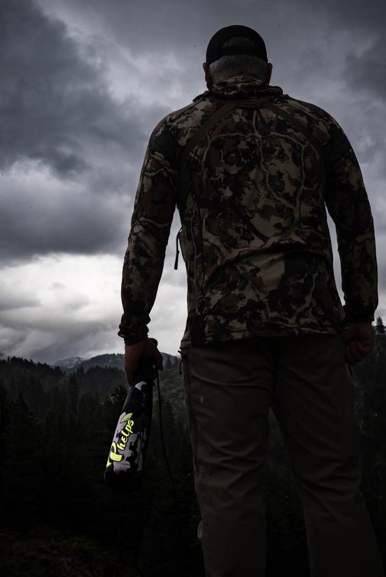 Camo Phelps game call with black, white, grey pattern and yellow text.