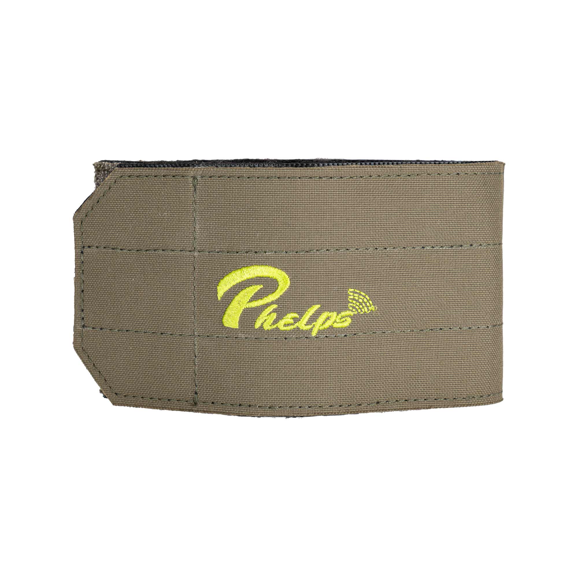 An olive drab hook and loop strap with a bright green embroidered 'Phelps' logo on the front, set against a plain white background.