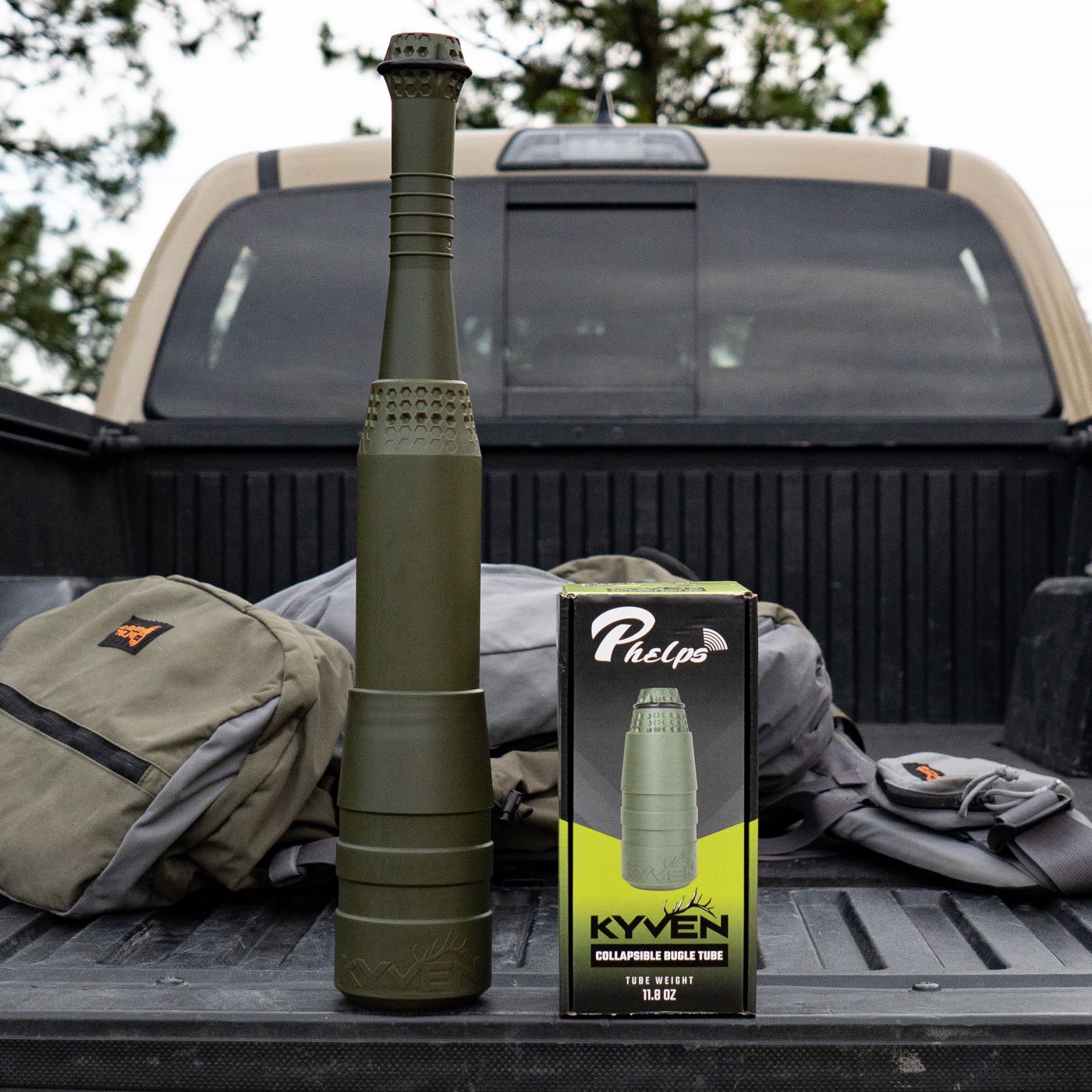 Kyven collapsible bugle tube on a truck tailgate next to the box it comes in
